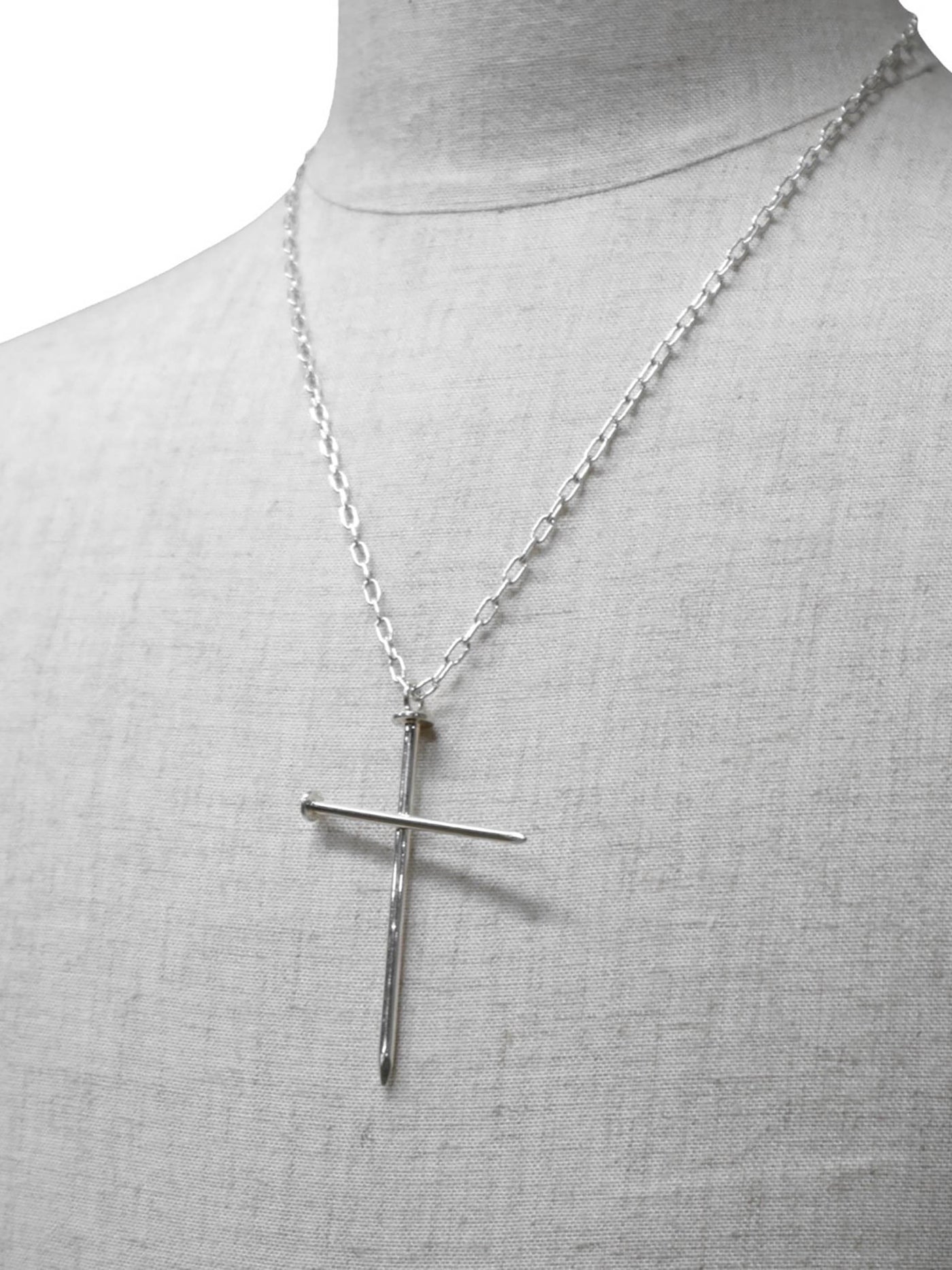 Crossed nail necklace